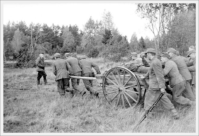 Klooga, Estonia, September 1944, German prisoners pulling a wagon filled with corpses